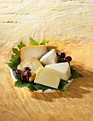 A cheese platter from Spain with grapes