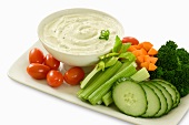 Platter of raw vegetables with dip