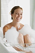 Young woman having a bubble bath