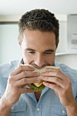 A man eating a sandwich