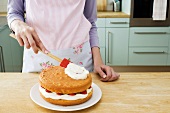 Woman making a cake