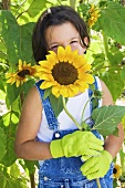 A girl with sunflowers