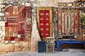Turkish rugs on wall in simena