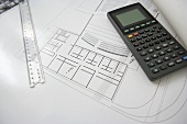 Calculator and architectural plans