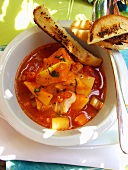 Spicy Creole fish soup with sweet potatoes