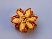 Nut nougat flowers with hazelnuts