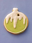 Green & white decorated biscuit as Christmas bauble