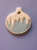 Blue & white decorated sweet pastry biscuit as Christmas bauble
