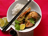 Grilled salmon cutlet with lime and rice