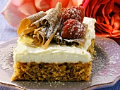 Nut cake with mascarpone, chocolate curls & raspberries
