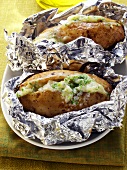 Baked potatoes with herb cream cheese