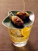 Stuffed dates on cocktail glass