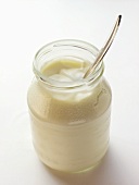 Yoghurt in jar with spoon