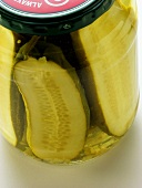 Jewish dill pickled gherkins (Kosher pickles) in jar (detail)