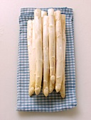 White asparagus on blue and white checked cloth