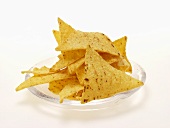 Tortilla chips on glass plate