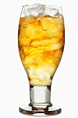 Iced tea with lots of ice cubes in glass