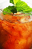 Cold fruit tea with fresh mint