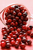Cranberries falling out of measuring jug