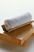 Japanese washcloth on wooden bench