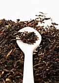 Dry Ceylon tea with spoon