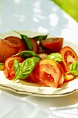 Tomatoes with fresh basil