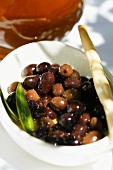 Marinated olives in olive oil