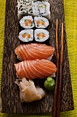 Nigiri-sushi and maki-sushi with ginger and wasabi