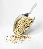 Rolled oats on metal scoop