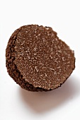 Black truffle, a piece cut off