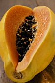 Fresh papaya, a piece cut off