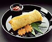 Spring roll with carrot flowers and ketchup