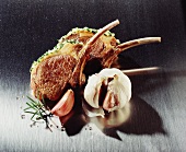 Lamb cutlets with herb crust; garlic; rosemary