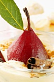 Pear in red wine with cinnamon in Madeira cream