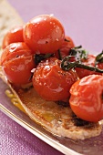 Stewed cherry tomatoes on white bread
