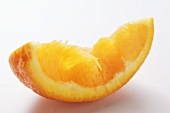 Squeezed wedge of orange