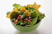 Mexican salad with vegetables and taco chips