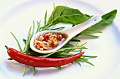 Chili garlic sauce in spoon (Asia)