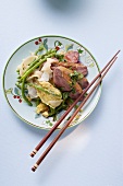 Duck breast with rice noodles and green asparagus (China)