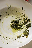 Remains of pesto on plate