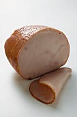 Turkey ham with a slice cut