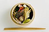 Steamed sea bass with ginger and vegetables
