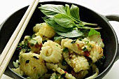 Spicy squid with Thai basil, cooked in the wok