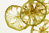 Deep-fried slices of candied lime, backlit
