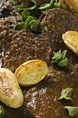Beef pot roast with potatoes (close-up)
