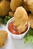 Dipping Chicken Nugget into ketchup
