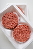 Raw burgers for hamburgers in packaging