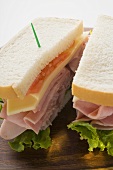 Ham, cheese and tomato sandwich (halved)
