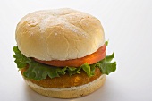 Chicken burger with tomato and lettuce