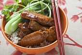 Chicken wings with rice and pak choi (Asia)